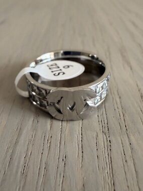 Fashion Women’s Designer Ring Titanium Steel Luxury Printed “C” Size: 9 (P65)